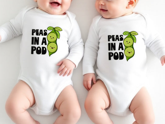 Cute twin babies wearing matching white cotton long sleeve onesies featuring a playful “Peas in a Pod” design; each onesie displays a pair of smiling green peas in a pod graphic next to bold black text saying “Peas in a Pod,” symbolizing the special bond between twins; perfect for twin baby photo shoots, sibling matching outfits, baby shower gifts for twins, and fun newborn announcement ideas; made from soft, breathable cotton fabric to keep infants cozy and comfortable.