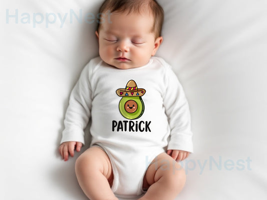 Personalized baby onesie featuring a cute cartoon avocado with a smiling face, wearing a colorful sombrero hat. You can customize it by printing baby name below in bold black letters. white short sleeve cotton bodysuit. Perfect for Cinco de Mayo baby outfits, personalized baby gifts, fun fruit-themed baby shower presents, or summer photo props; made of soft, breathable cotton for infant comfort.